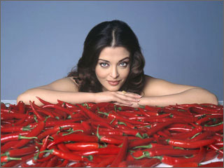 Happy and famous Aishwarya Rai with a lot of chilli peperonis.